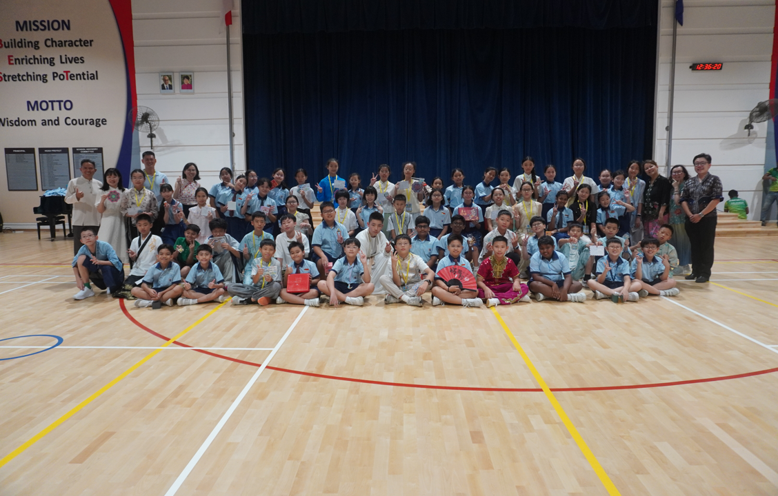 Large group photo of students and teachers gathered together